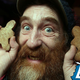 Sinister-looking man holds gingerbread men